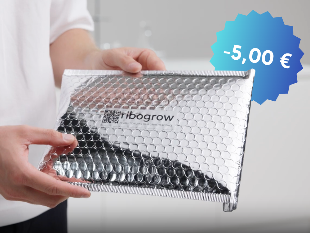 Zeigt eine Silber glänzende ribogrow Verackung mit einem 5€ Gutschein Zwichen für den Newsletter signup