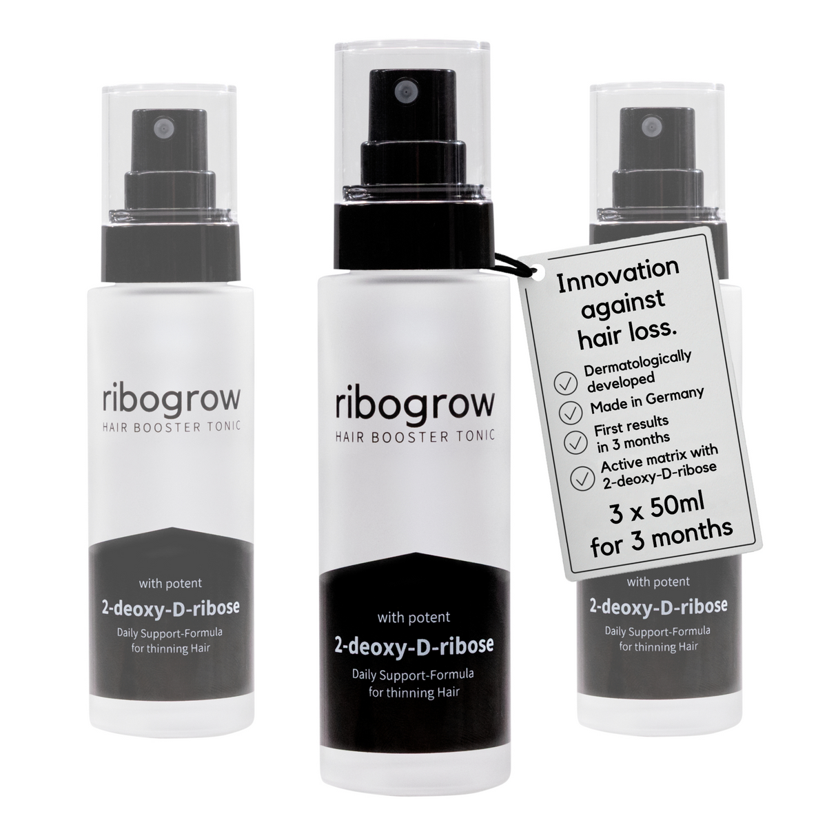 ribogrow hair booster tonic displayed as a triple pack with three frosted glass spray bottles featuring black spray pumps and transparent protective caps. Each bottle is labeled “hair booster tonic” and “with potent 2-deoxy-D-ribose,” described as a daily support formula for thinning hair. A hanging product tag highlights innovation against hair loss, dermatological development, production in Germany, first results in 3 months, and an active matrix with 2-deoxy-D-ribose. The tag specifies 3 x 50 ml.