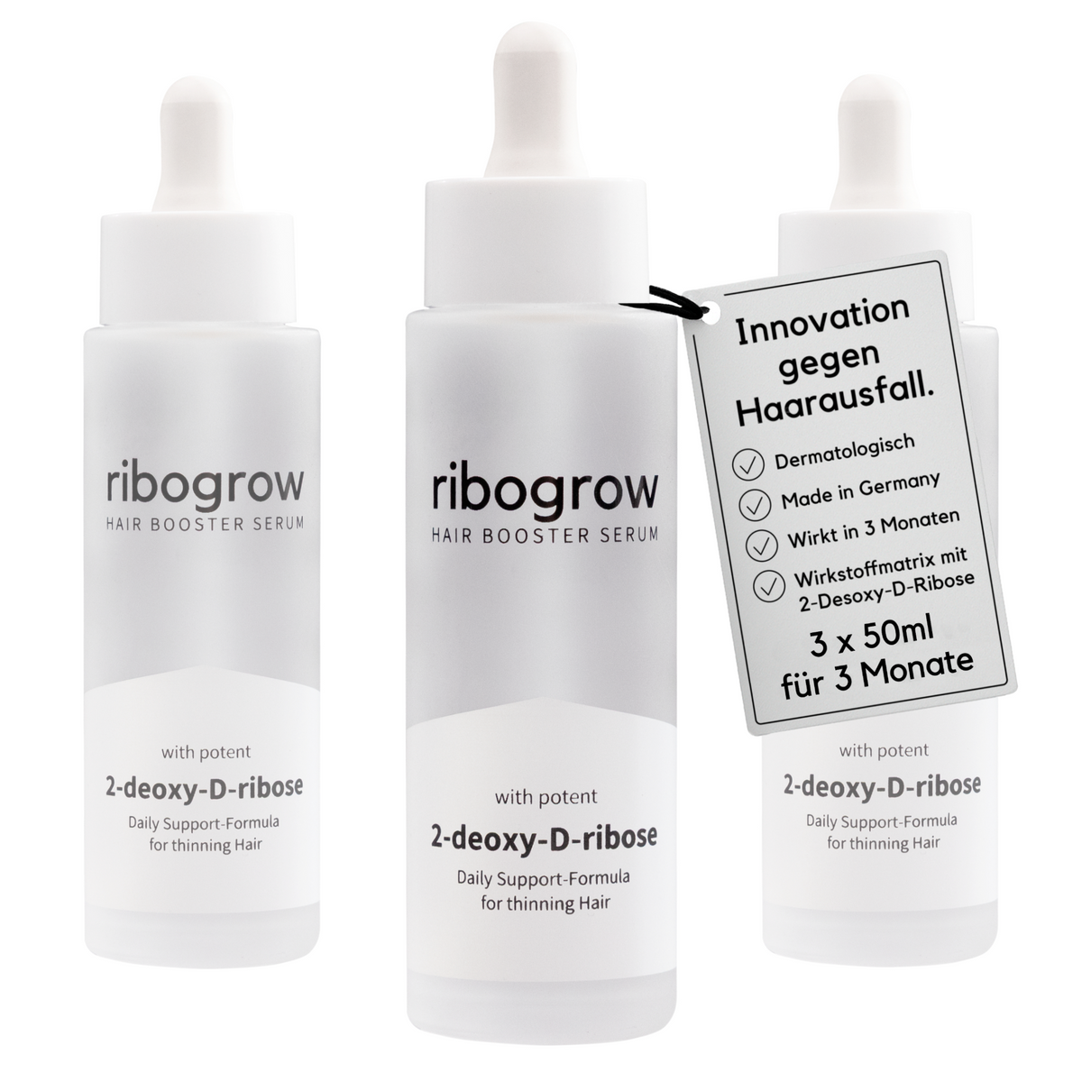 Drei Flaschen des ribogrow Hair Booster Serum mit Wirkstoff 2-deoxy-D-ribose. Rechts hängt ein Etikett mit den Vorteilen des Haarwuchsserums: dermatologisch entwickelt, Made in Germany, sichtbare Wirkung nach 3 Monaten und innovative Wirkstoffmatrix mit 2-Desoxy-D-Ribose. Hinweis: 3 × 50 ml für eine vollständige 3-Monats-Kur gegen Haarausfall.