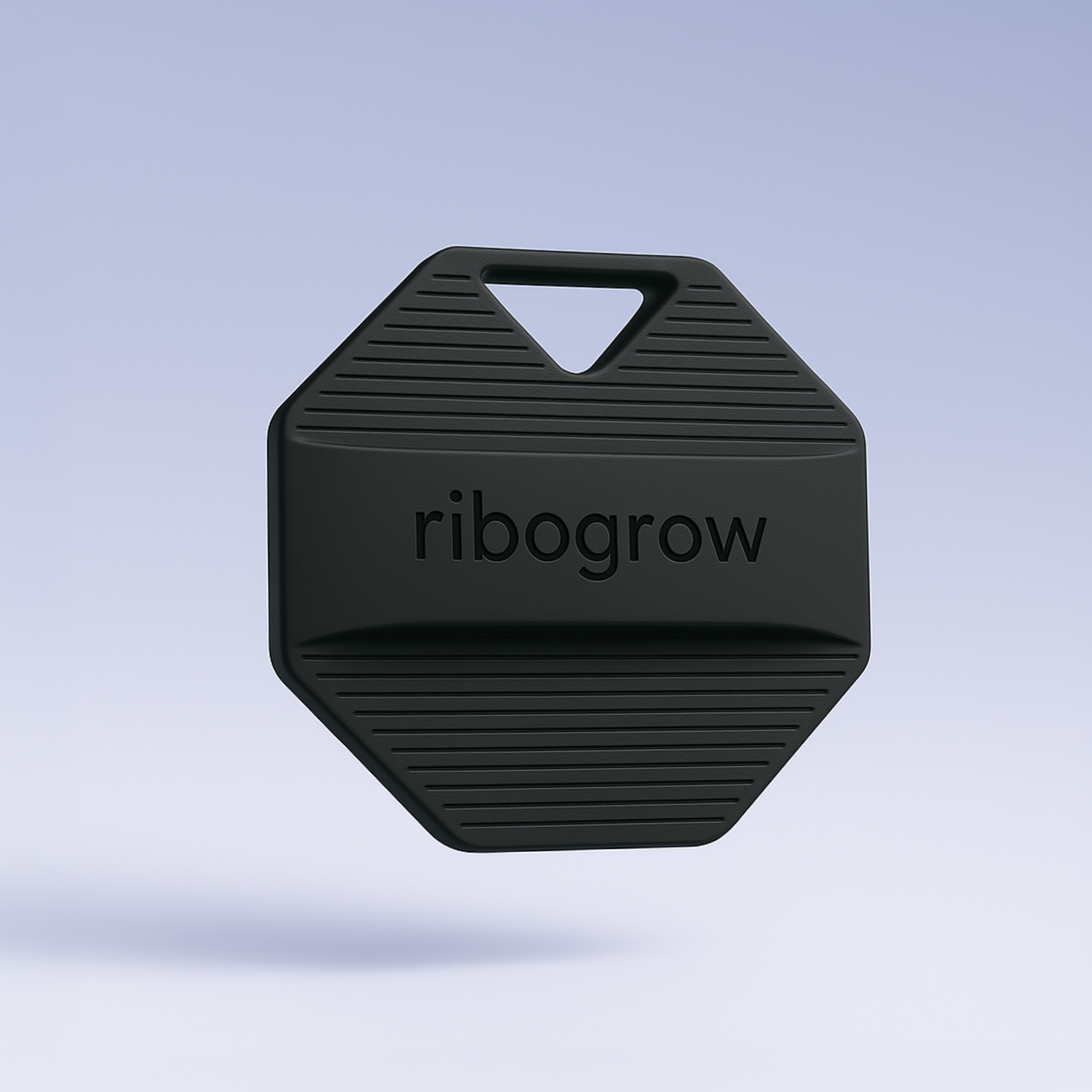 Showing the ribogrow silicone scalp brush front side. A scalp massager and a sleek, ergonomic hair tool designed to boost blood circulation, exfoliate the scalp, and promote healthy hair growth. Perfect for daily use in the shower or with the ribogrow Hair Booster Serum.